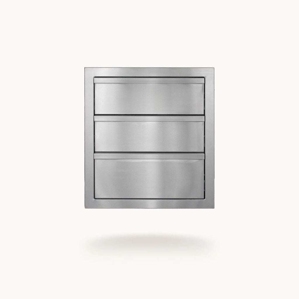 A stainless steel three-drawer cabinet or drawer-front panel shown centered on a plain light background with a soft shadow underneath.