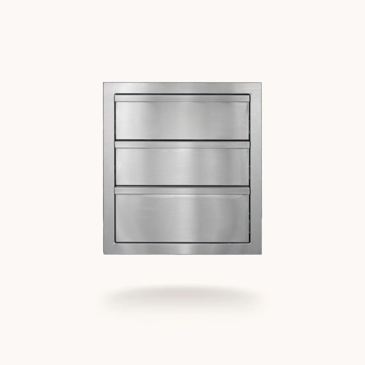 A stainless steel three-drawer cabinet or drawer-front panel shown centered on a plain light background with a soft shadow underneath.