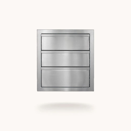 A stainless steel three-drawer cabinet or drawer-front panel shown centered on a plain light background with a soft shadow underneath.