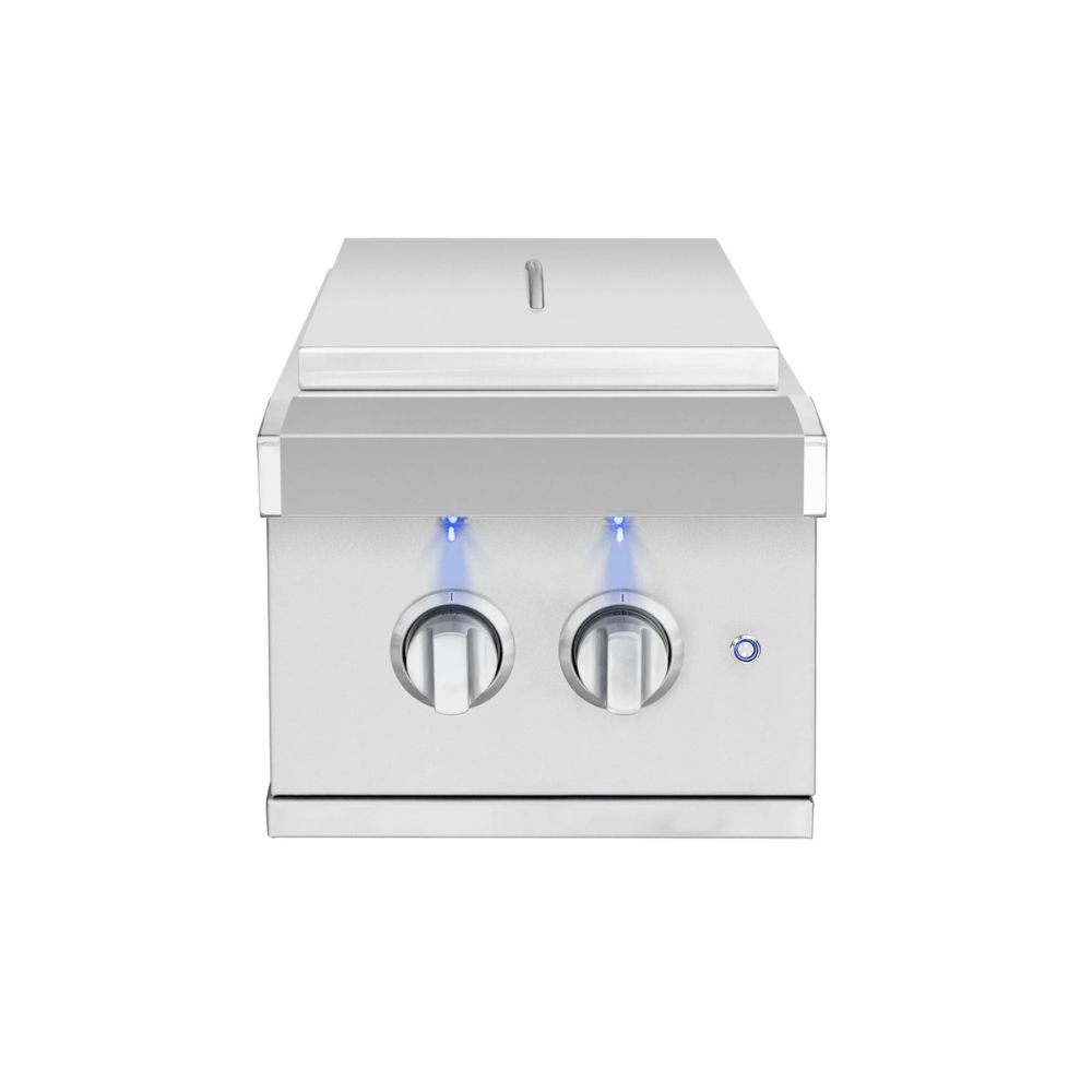 A stainless steel built-in grill or outdoor cooktop with two front control knobs, blue indicator lights, and a flat lid, shown on a plain white background.