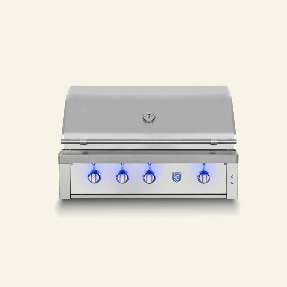 A stainless steel outdoor gas grill with a closed lid, four control knobs, and blue LED lighting accents, shown against a solid light beige background.