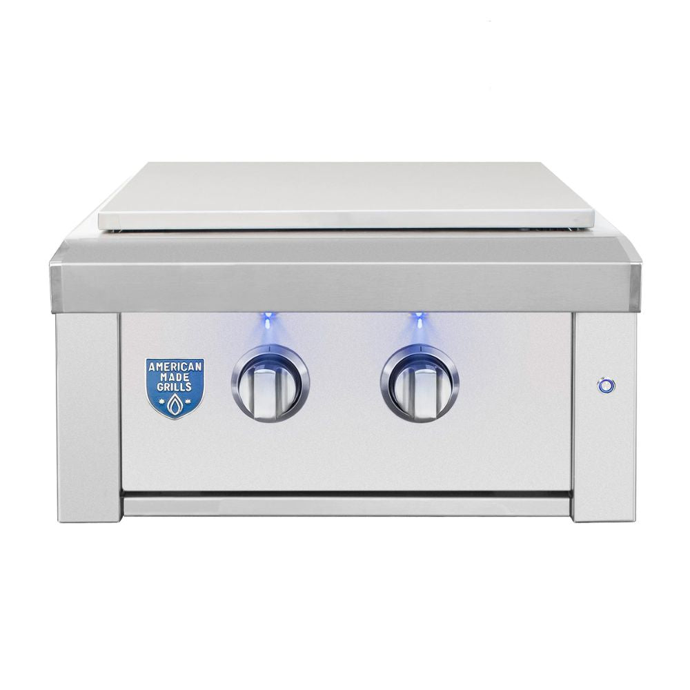 Stainless steel grill with American Made Grills logo on a white background