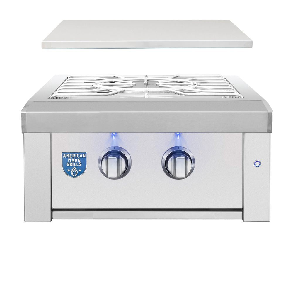 Stainless steel gas grill with American Made Grills logo on a white background