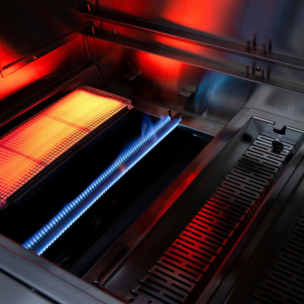 Close-up of a 3D printer with red and blue lights inside.