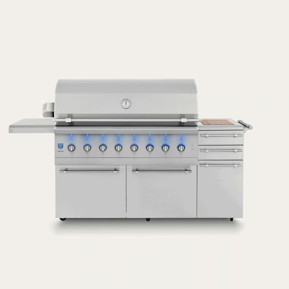 A stainless steel outdoor kitchen grill and cooktop system with six blue-lit control knobs, a side shelf, drawers, and a cooktop surface, shown on a plain light background.