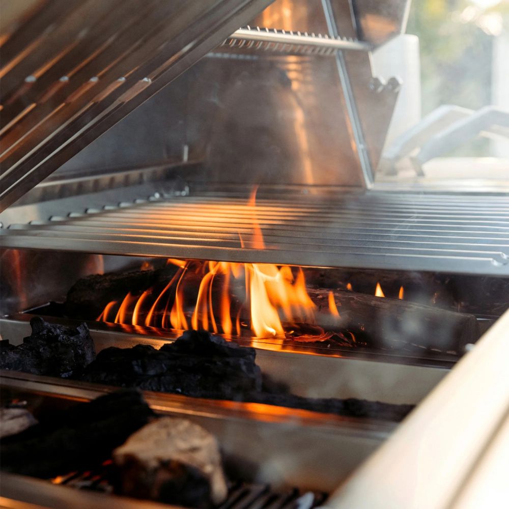Close-up of a flaming grill with metal components