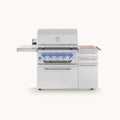 A stainless steel outdoor gas grill with a side shelf, three drawers, and blue LED lighting under the control panel, shown on a light beige background.