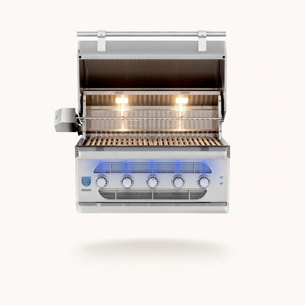 A stainless steel gas grill with its lid open, showing the interior grates and glowing burners, set against a plain off-white background.