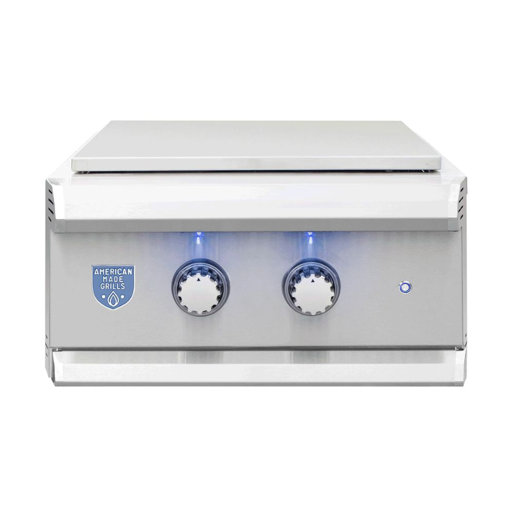 American Blue Grills 3-burner gas grill with a stainless steel flat top and front control knobs, shown against a plain white background.