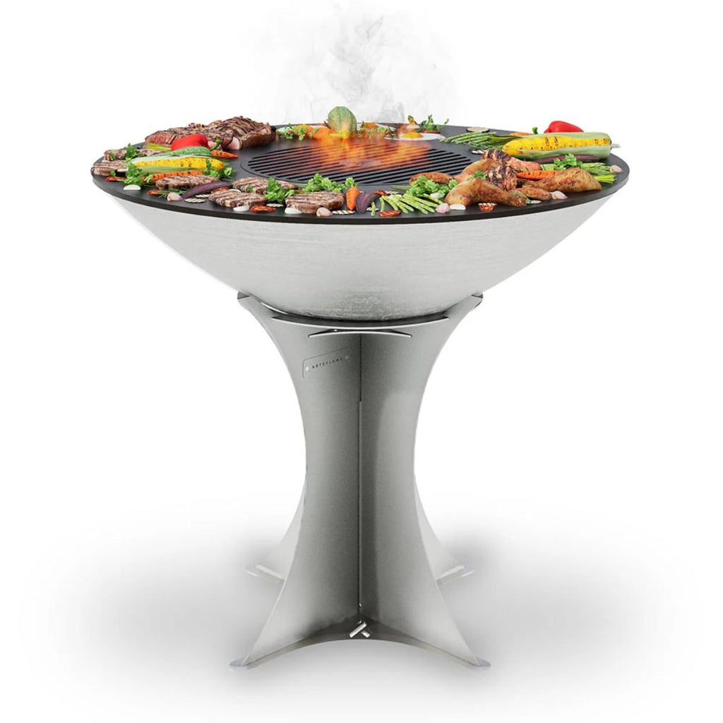 Modern grill with food on a white background