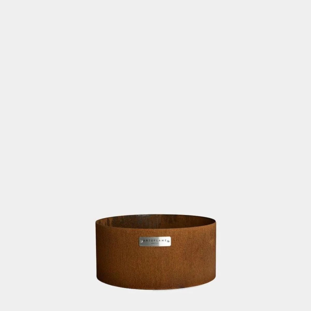 Brown fabric basket with a visible brand label on a white background