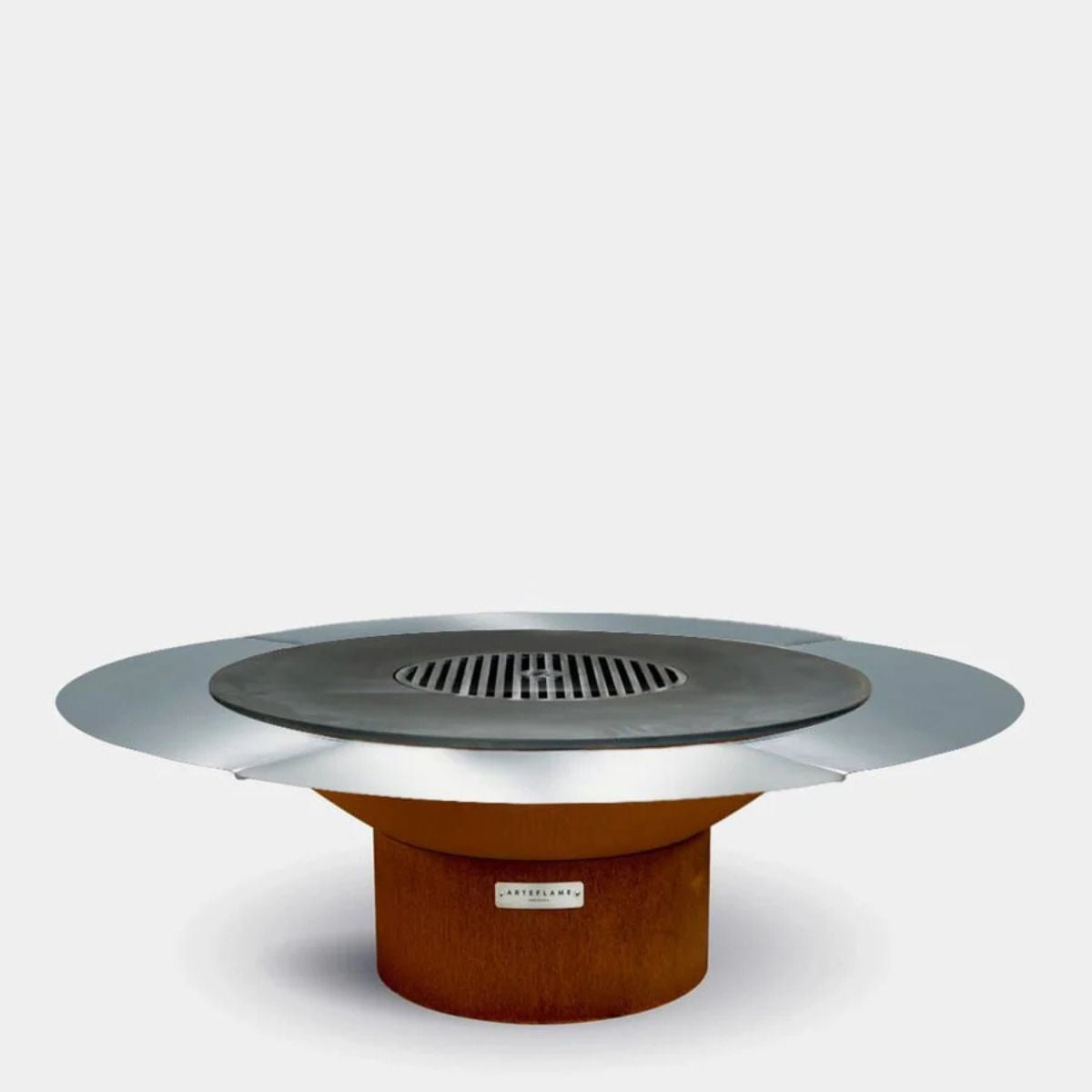 Modern outdoor fire pit with metal top and brick base on a white background