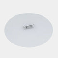 Round glass cover with a metallic handle on a white background