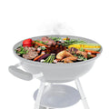 Barbecue grill with food on a white background
