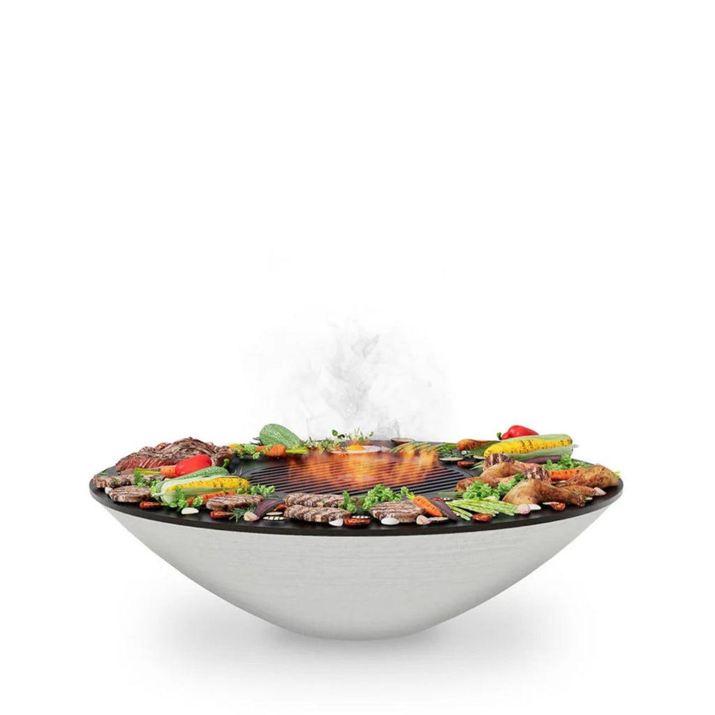 Wok-style grill with food on a white background