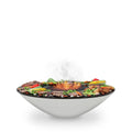 Wok-style grill with food on a white background